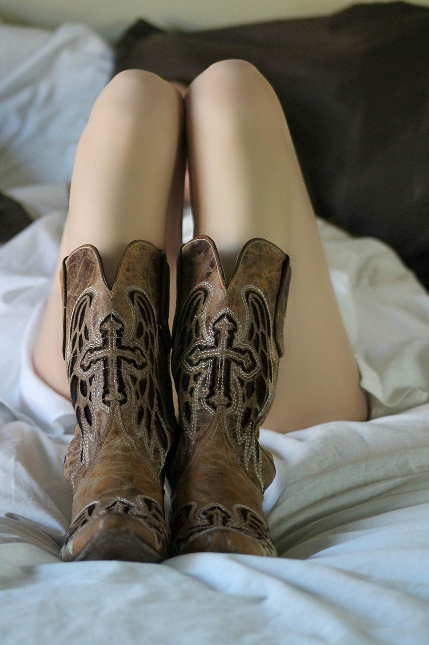 woman, legs, boots, leather, leather boots, lying down, bed, footwear, shoes, bouidoir, cowboy boots, western, cowgirl